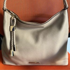 Michael Kors Pebbled Leather Shoulder bag 7.75” W x 6” H x 3” D; Handle Drop 9”